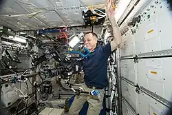 ISS-56 Ricky Arnold films on the ISS with a Helium 8K camera. The station was designed between 1984 and 1993. Elements of the station were in construction throughout the US, Canada, Japan, and Europe beginning in the late 1980s.