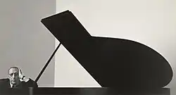 Photograph of Igor Stravinsky on a piano