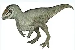 Reconstruction of the theropod dinosaur Tachiraptor admirabilis. Artwork created with graphite and colored pencils. Author: Edwin Chávez "Disfrasaurio".