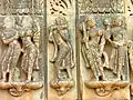 Vandalized artwork. From left: Amorous couple, man with flute, woman with veena, man.