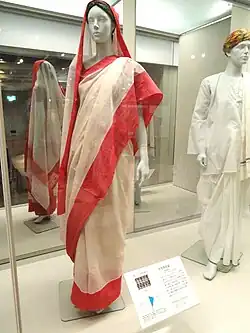 Image 82Red and cream Indian woman's saree, late 1990s (from 1990s in fashion)