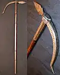 Indian war hammer, 19th century, hard wood shaft with full length metal strip for re-enforcement, silver koftgari decoration