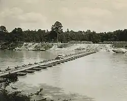 Treadway style infantry support bridge built on light aluminum pontons