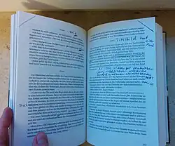 A German novel, Infinite Adventures, with an infinity symbol in triplicate as a dinkus