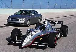 Infiniti Indy car next to a production Q45