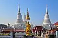 The temple and white stūpas