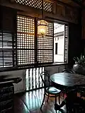 View of a capiz shell window and its ventanilla from inside the third floor of Casa Manila