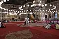 Interior view towards the mihrab niche (left) and the two minbars (center and center left)
