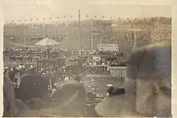 A 1917 photograph of horses on a race track at the Grandstand.