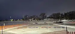 Rock the River Winter Festival Rinks at night