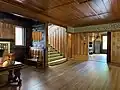View of main stair from the central hall, 2025