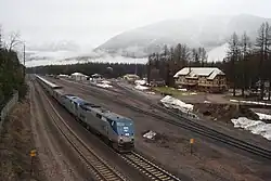 The Empire Builder passing the Izaak Walton Inn