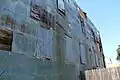 Historic tin siding on building. Pressed tin was used to fire proof many of the wooden buildings after the 1926 fire.
