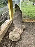 Isolated menhir separate from the main tomb area