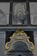 Grisaille paintwork (above) inside the mosque, likely dating from a 19th-century repainting of the decoration[12]