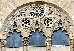 Gothic arches in a window of Orsanmichele.