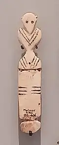 Ivory human figures, Matmar grave 2682. Naqada IC.[75]