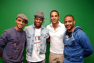 JLS at KISS FM in Chicago in April 2010, from left to right: Merrygold, Williams, Humes, and Gill