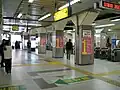 Ticket gates at the south and west exits