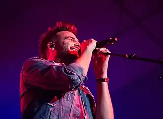 Jackie Lee performing in concert in 2017