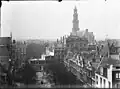 The demolition of houses on Herengracht for the construction of Raadhuisstraat (photo by Jacob Olie, April 1896). In the foreground, the filled-in Warmoesgracht.