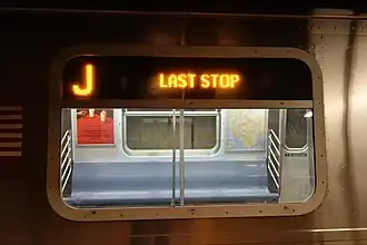 The LED side destination sign of an R179 car