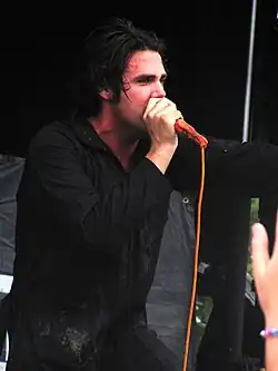 Evigan performing with After Midnight Project at the 2010 Warped Tour
