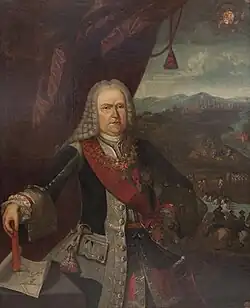 Color portrait shows a man wearing a dark military uniform and a long early 18th century wig.