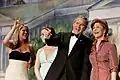 President George W. Bush points out members of the audience to First Lady Laura Bush during the "Black Tie and Boots Inaugural Ball" in Washington, D.C held on January 19, 2005.