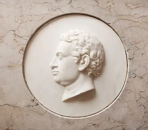 Portrait relief of Jens Krag-Juel-Vind on his sarcofagus.