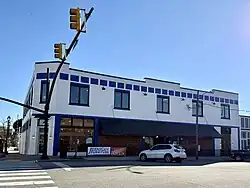 The Whitley Furniture Galleries main building, repainted in blue and white