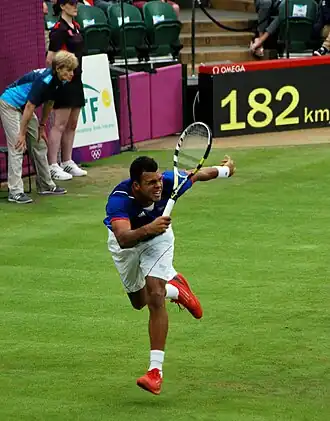 Tsonga hitting a running forehand return