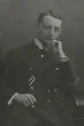 Spiess posing on an armchair