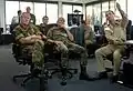Gen. Sir John Reith (U.K.) and Gen. Ranier Shuwirth (Germany) receiving an operations brief by Turkish Naval Capt. Cengiz Ekin on May 3, 2007.