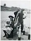 Original caption: "Negro Family waiting for ride into town", Halifax County, Virginia, March 1941.