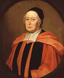 Portrait of John Wallis, wearing a black cap and red and black robes; painted in 1701 (when Wallis was 85) by Sir Godfrey Kneller, from the National Portrait Gallery