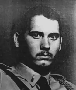 Black and white front-facing photo of Tommasi
