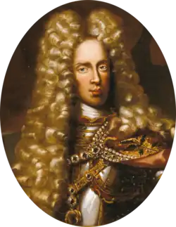 Oval painting of a man wearing an enormous curly blonde wig that reaches to his chest. Under his pretty golden tresses he wears a steel cuirass.