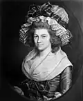 A portrait by English landscape and portrait painter, Joseph Wright of Derby, of an unidentified woman sporting a large mobcap