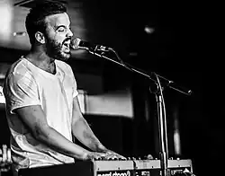 Juan Zelada playing piano