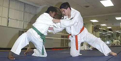 Image 59Two judoka wearing judogi (from Judo)