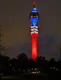 The Kaknäs Tower illuminated in the colours of the French flag in memorial to the November 2015 Paris attacks.