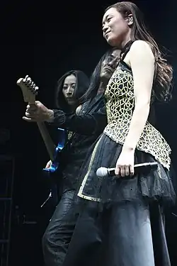 Wakana (right) in 2016