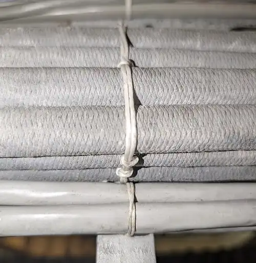 Cables laced together using a Kansas City stitch.
