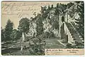 Ca. 1900: Around the castle gate; postcard by Karl Friedrich Wunder