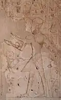 Relief from the Barque Chapel of Thutmosis IV showing Thutmose IV wearing the Khepresh and making offering to the gods.