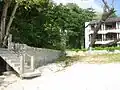 The first tsunami stopped exactly at the top of the beach wall
