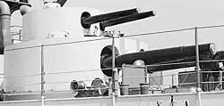 A smaller gun turret on top of a bigger turret