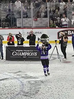 Pannek skates on the ice with the 2025 Walter Cup