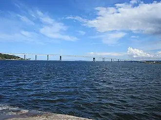 A large road bridge stretching over a body of water
